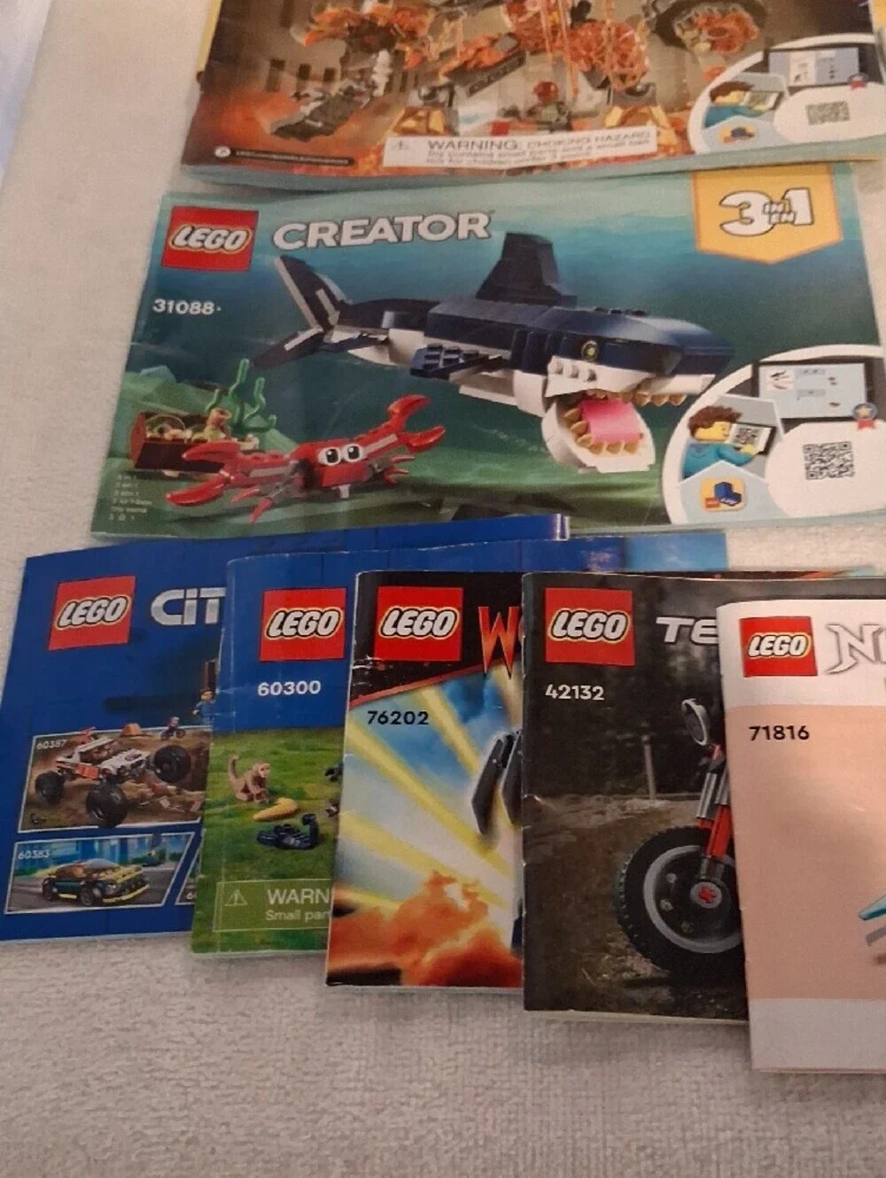 Lego Instruction Manual Lot - Blue, Yellow, Red, Orange Covers